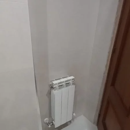 Baño terminado, detalle de radiador